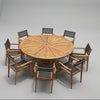 Top view of 9pc dining set Teak 6ft Helios round dining table set with 8 stacking teak baytline chairs